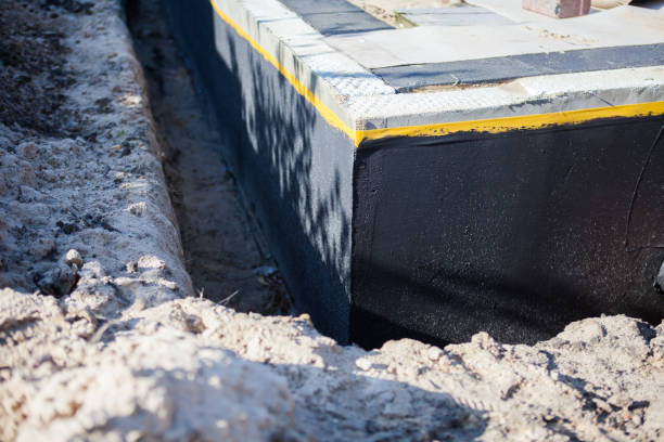 Professional Interior Drainage System technician working in Finksburg, MD